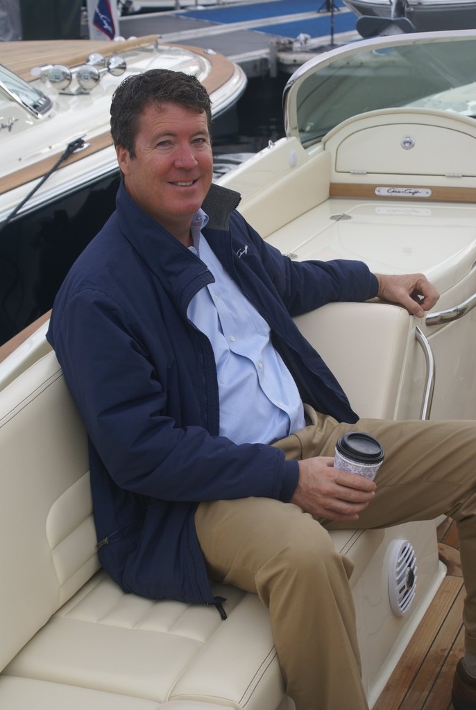 Even Presidents need a coffee break - Chris-Craft chief Steve Heese takes breather on the Premier Marine display at the Sydney International Boat Show.   © Bob Wonders